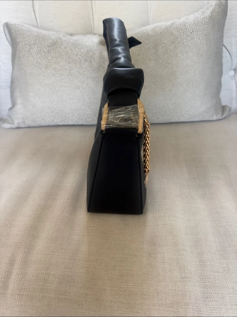 Anne Klein knotted satchel. Black Leather Top-Handle Bag with Gold Chain Accent